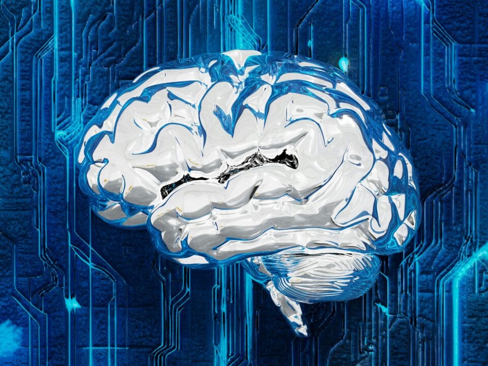 Digital artwork of a metallic brain on a circuit board representing innovation matchmaking and AI connectivity